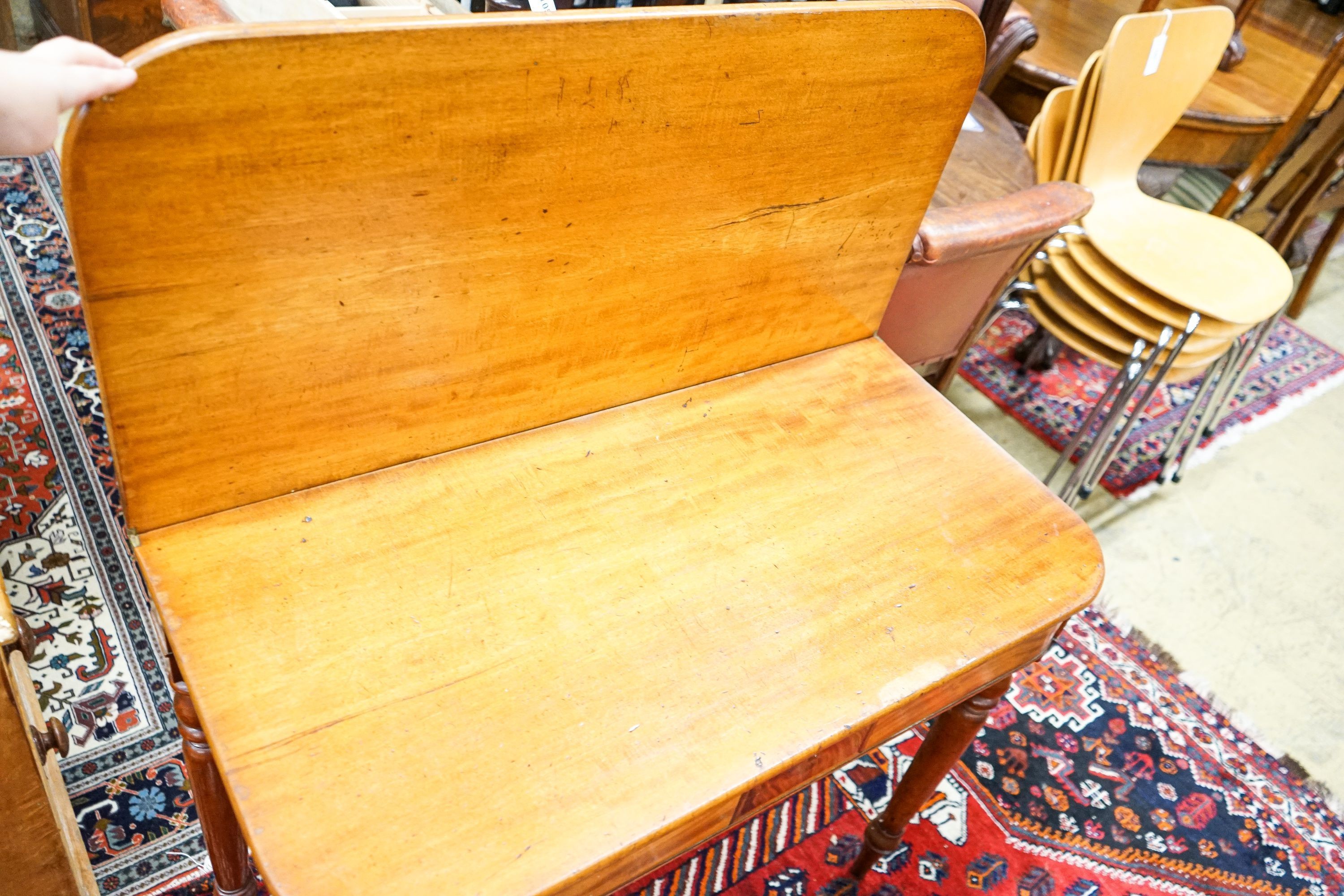 A George IV faded mahogany rectangular folding tea table, width 90cm, depth 45cm, height 76cm
